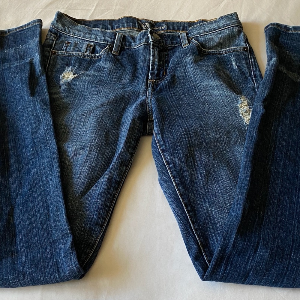 NWOT BEBE Women's Blue Distressed Jeans with Red Rhinestones!